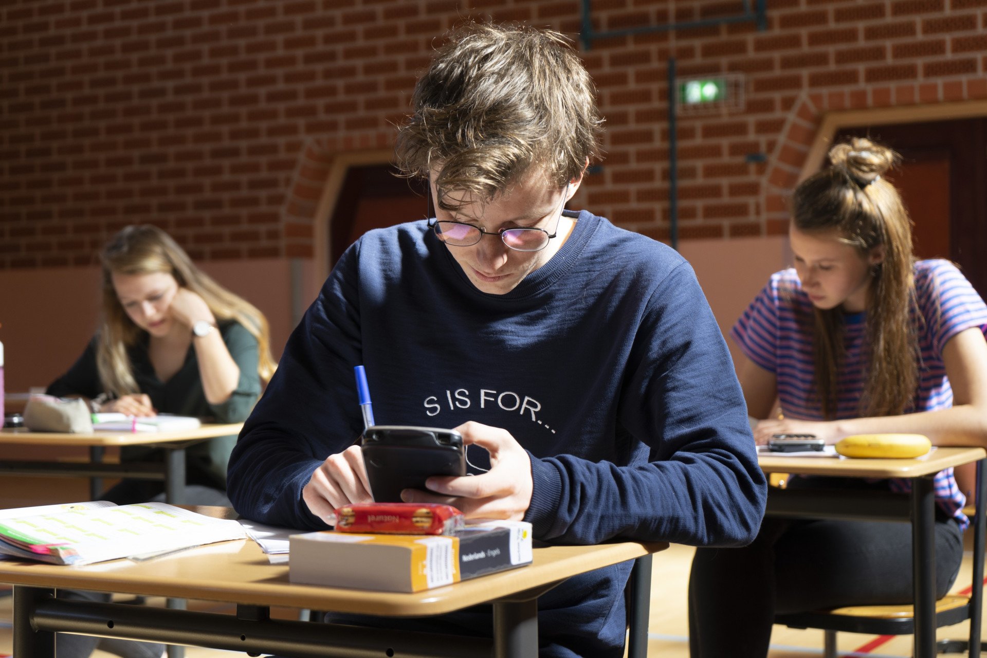 Veel aflezen en weinig algebra in vwoexamen wiskunde A Eindexamens